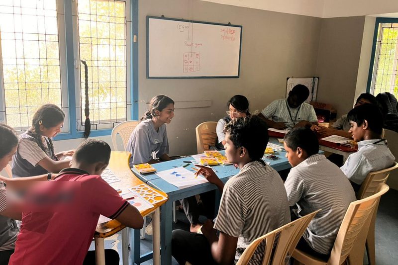 Shruti Arvind with students at Swabodhini during a stencil activity
